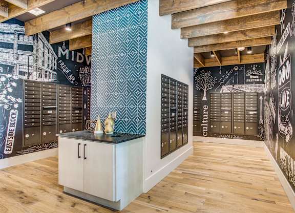 Community mail room Midway Urban Village Luxury Townhomes and loft apartments in Farmers Branch, Texas near North Dallas. Luxury North Dallas Townhomes for rent
