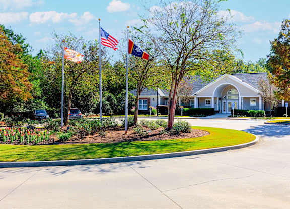 A building with a flagpole in front of it.