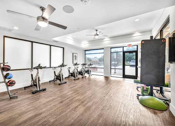 Large open gym with bikes at Markethaus 3700 in Plano Texas
