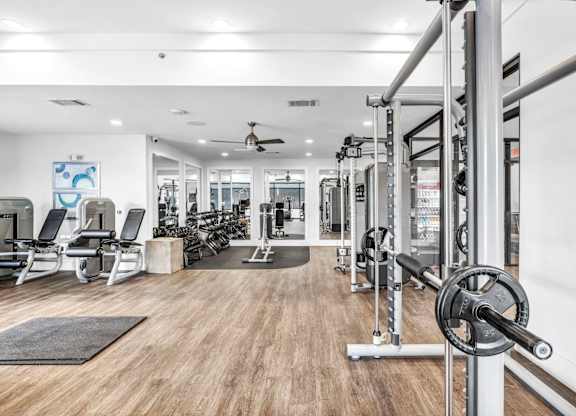A gym with a variety of equipment at Markethaus 3700 in Plano Texas