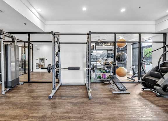 A gym with a squat rack at Markethaus 3700 in Plano Texas