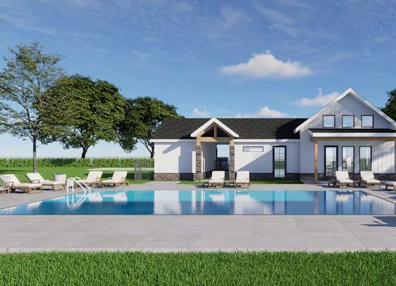 Dog-Friendly Townhomes in Spring Hill, KS - Hidden Hills - Swimming Pool with Sun Loungers, Trees, Grass, and Clubhouse