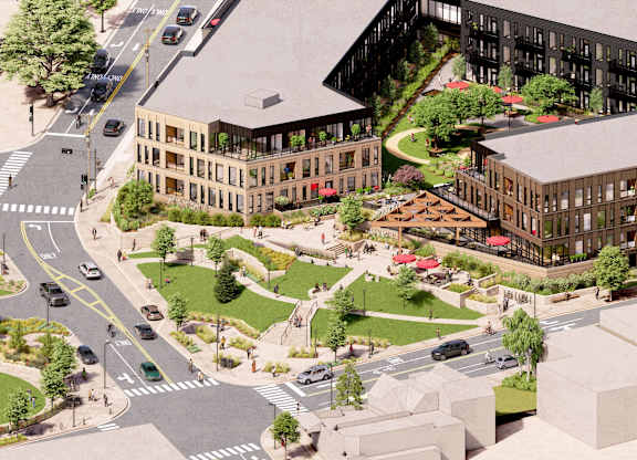 A rendering of a city intersection with a large building in the background.