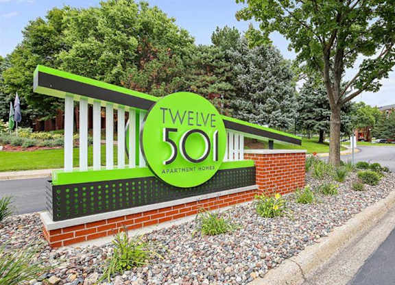 A green and white sign that says Twelve says 501.