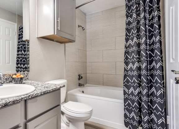 Bathroom with modern finishes at The Lana, luxury apartments in North Dallas