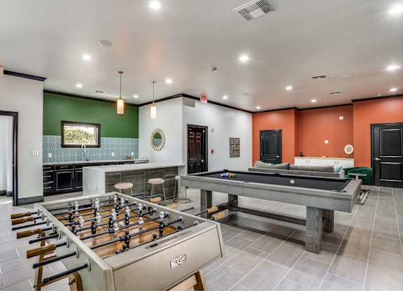 Game room with billiards and foosball at The Lana , North Dallas apartments for rent
