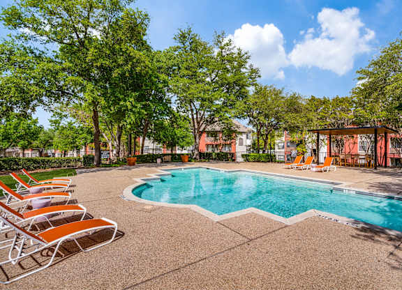 Landscaped pool area at The Lana, Dallas apartments