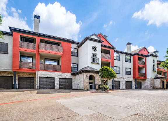 Exterior of The Lana, apartments in Dallas, TX with private garages and balconies