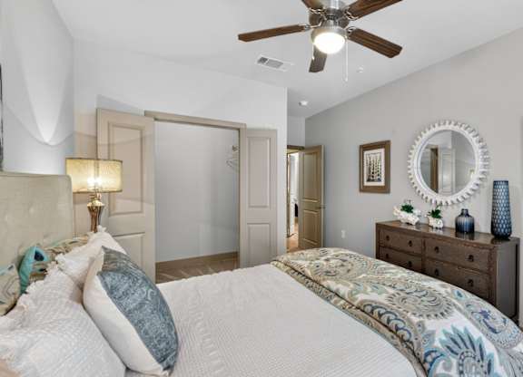 Comfortable bedroom at The Carson at Twin Creeks, Allen apartments