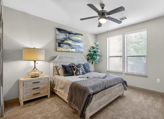 Bedroom with natural light at The Carson at Twin Creeks, Allen, TX apartments