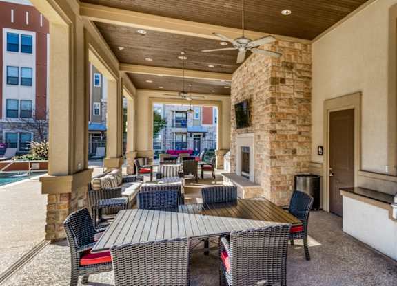 Outdoor grilling area at The Carson at Twin Creeks, apartments in Allen