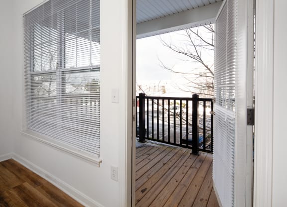 Living space door open to balcony