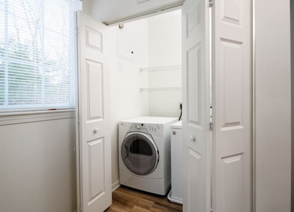 Laundry room with full size washer and dryer
