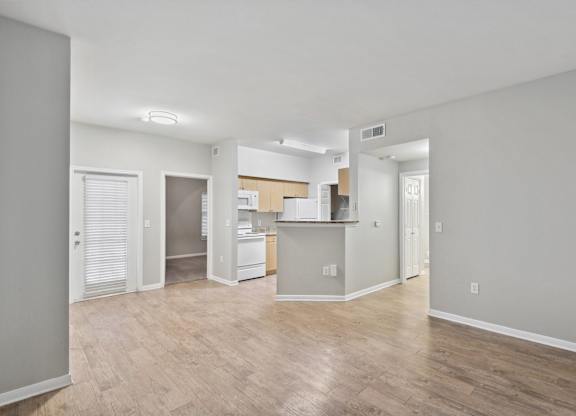 living area with ceiling lights and hardwood like flooring