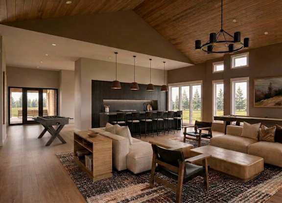 A modern living room with a wooden ceiling and a large rug.