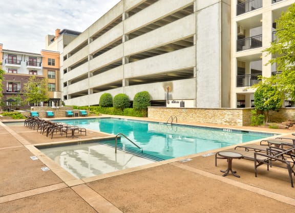 our apartments have a large pool and lounge chairs