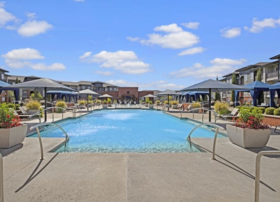 a swimming pool at the resort on a sunny day