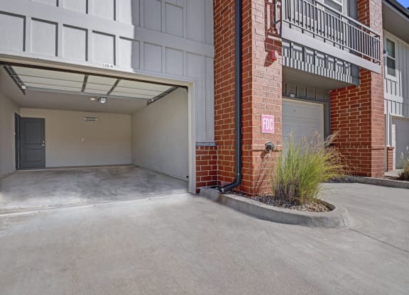 the entrance to a building with an empty parking garage