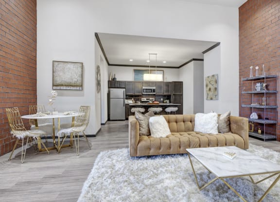 a living room with a couch and a table
