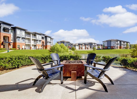 the preserve at ballantyne commons patio with chairs and a fire pit