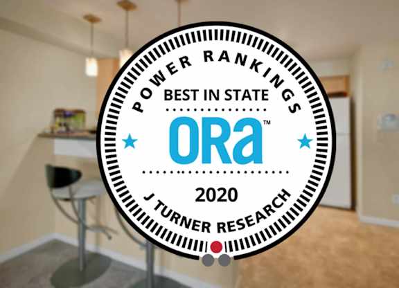 A room with a round badge that says