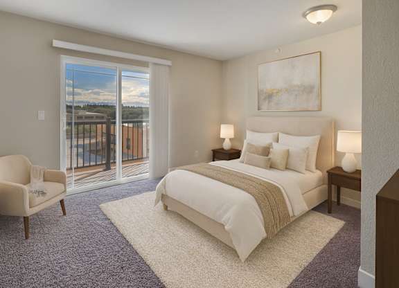 A bedroom with a large bed and a chair by a window.