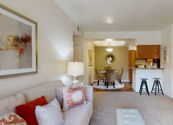 Living room, dining, and kitchen space