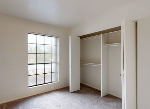 Bedroom 2 with window and closet