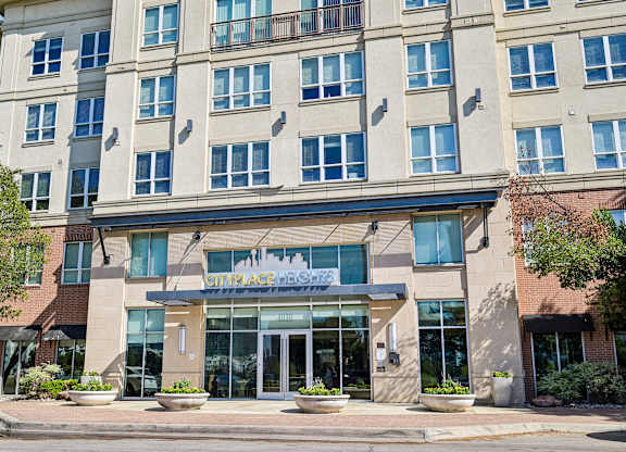 The front of a building with the words "Gateway on the Green" written on the entrance.