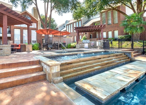 Lakewood on the Trail outdoor entertainment area with pool access Apartments in Dallas, TX