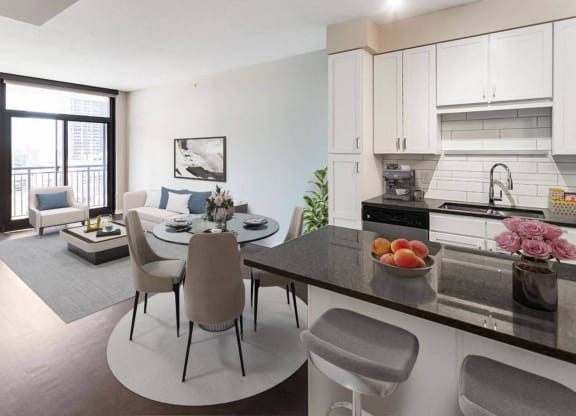 Nic on 5th Apartments in Minneapolis, Minnesota- Large furnished kitchen and living room with wooden floors and tall windows