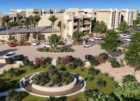 Rendering of our modern Reflect at Dobson Ranch Apartment complex with beige buildings, surrounded by lush landscaping, palm trees, and a circular driveway with parked cars.