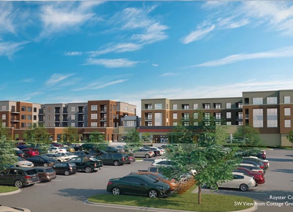 a rendering of an apartment complex with cars parked in a parking lot