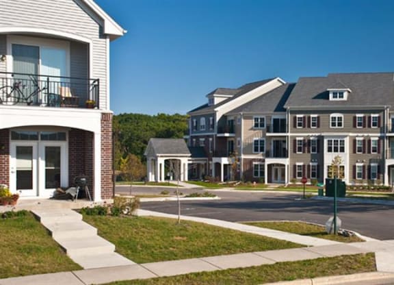a row of houses on the side of a street