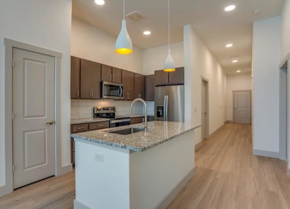 a kitchen with a counter top and