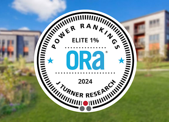 A badge with the text "POWER RANKINGS ELITE 1%" and "ORA 2024 J TURNER RESEARCH" on it.