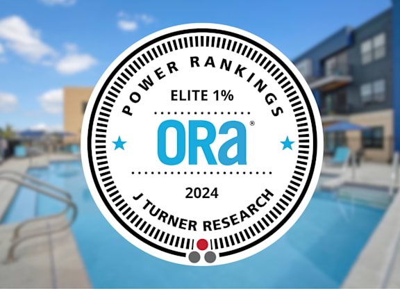 A circular logo with the text "POWER RANKINGS ELITE 1% Ora 2024 J TURNER RESEARCH".