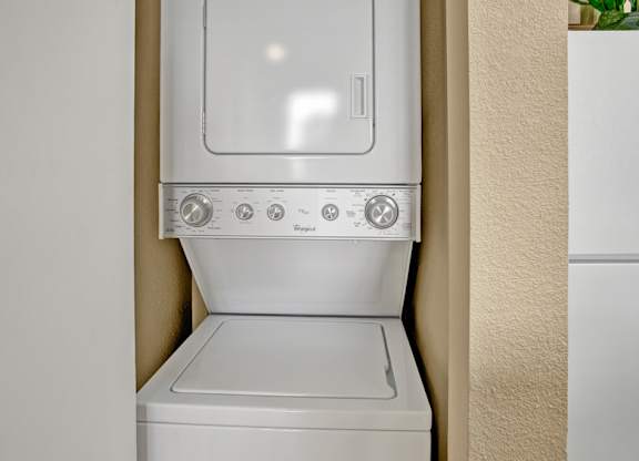 A white dishwasher is installed in a kitchen.