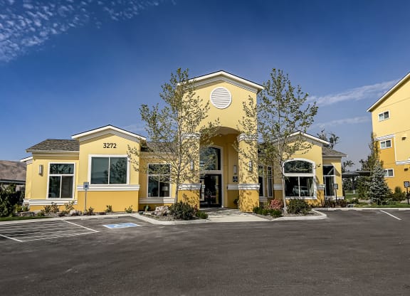 a building with a parking lot in front of it