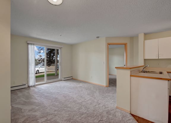 Manning Crossing Living Room and Balcony Apartments for rent in Edmonton, AB