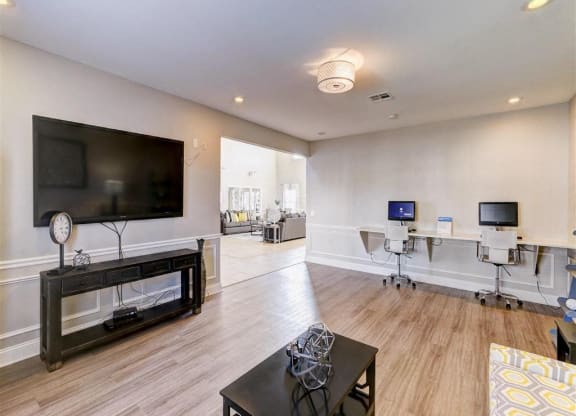 Residence at North Penn entertainment room with computers and television