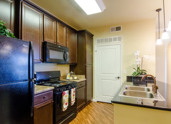 Andalucia Villas Kitchen with Granite Countertops Apartment for rent in Odessa, TX