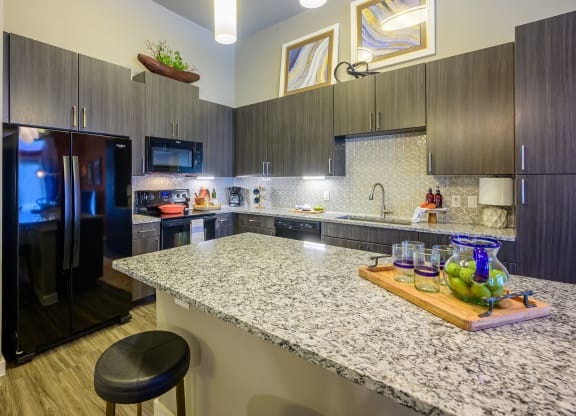 Harmony Luxury full size kitchen with granite countertops
