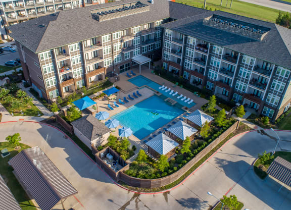 Harmony Luxury Apartments outdoor view with pool Apartments for rent Rowlett, TX 75089