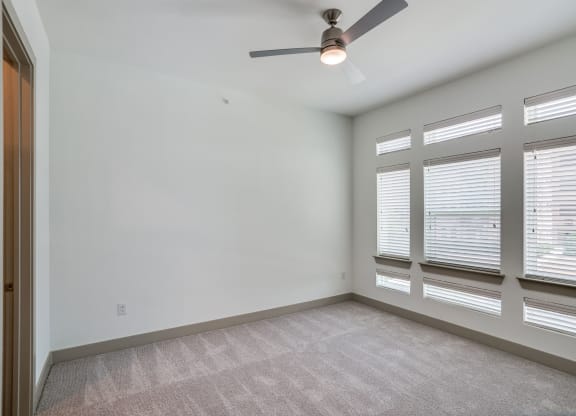 The Crosby at The Brickyard bedroom and living space Apartments near DFW