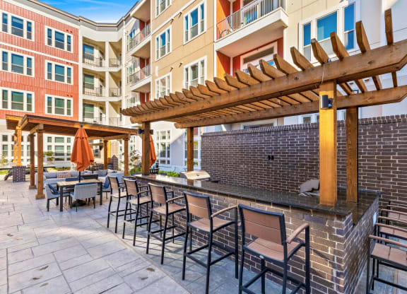 Waterford Market Apartments Outdoor Grill and Seating Frisco Texas Apartments for rent