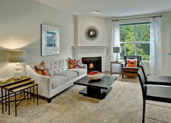 Portsmith Living Room with Fireplace Apartments in Everett, WA