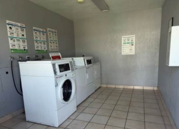 A laundry room with a washer and dryer.