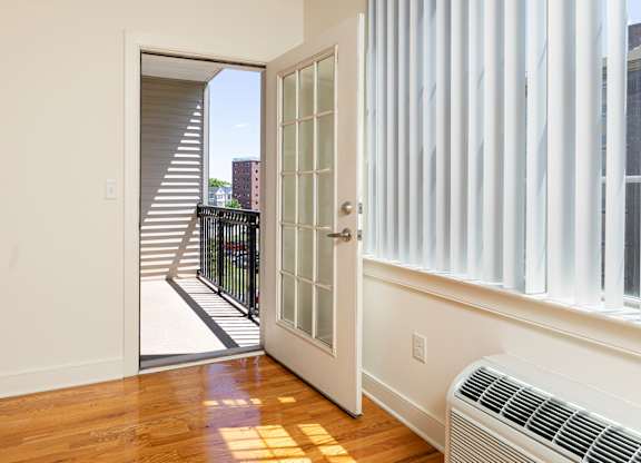 Sun-filled Bayonne apartment with private balcony, hardwood floors, and upscale finishes