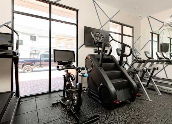 Contemporary resident gym at Bridgepoint at Bayonne with high-end equipment and bright interiors